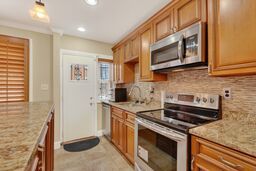 3 bedroom rowhome with detached 1-car garage property image